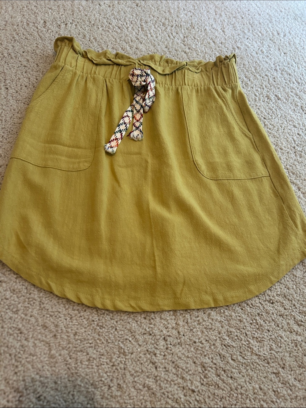 Potter's Pot Green Ruffled Waist Mini Skirt with Braided Drawstring